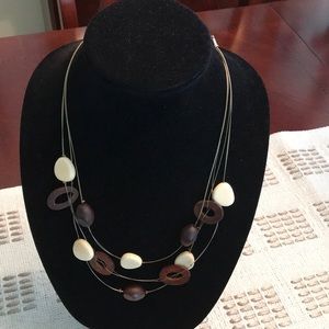 Multi strand necklace with wood beads & faux ivory